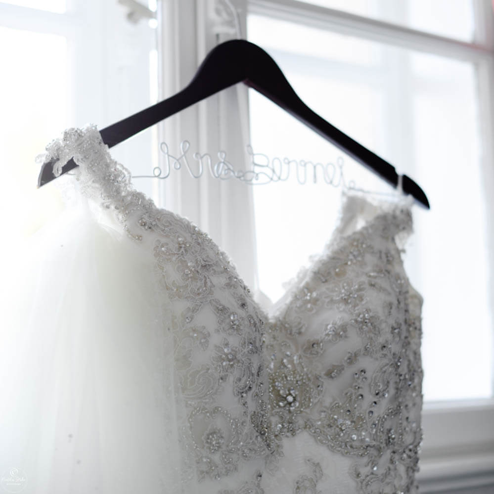 Photo of bridal gown on hanger