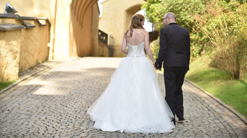 Wedding Neuschwanstein Castle photo of couple walking