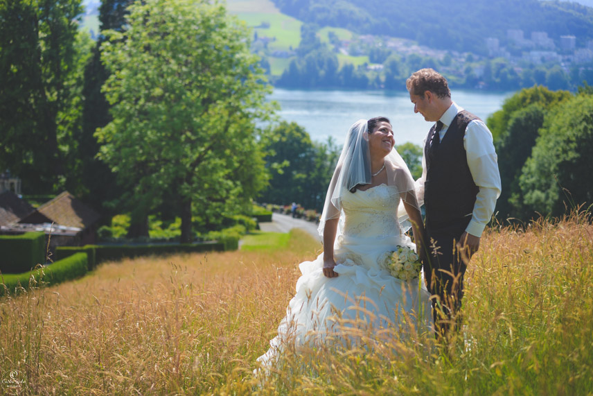 wedding in Switzerland couple in grass